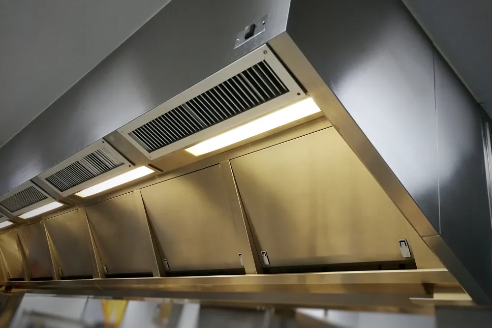 Kitchen exhaust hood repair service for smoke heat and odor removal in UAE